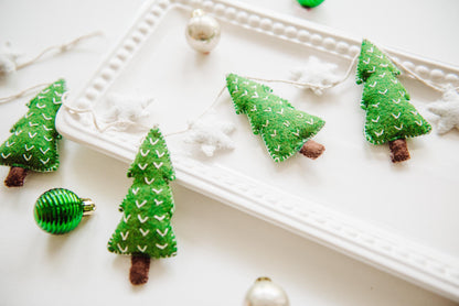 Felt Christmas Garland featuring tiny green christmas trees and white stars. Perfect christmas garland for mantle.